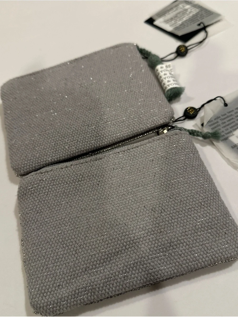 America & Beyond compact gray